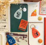 3P4 x Peanuts® Halloween - Snoopy Mummy Saddle Keychain