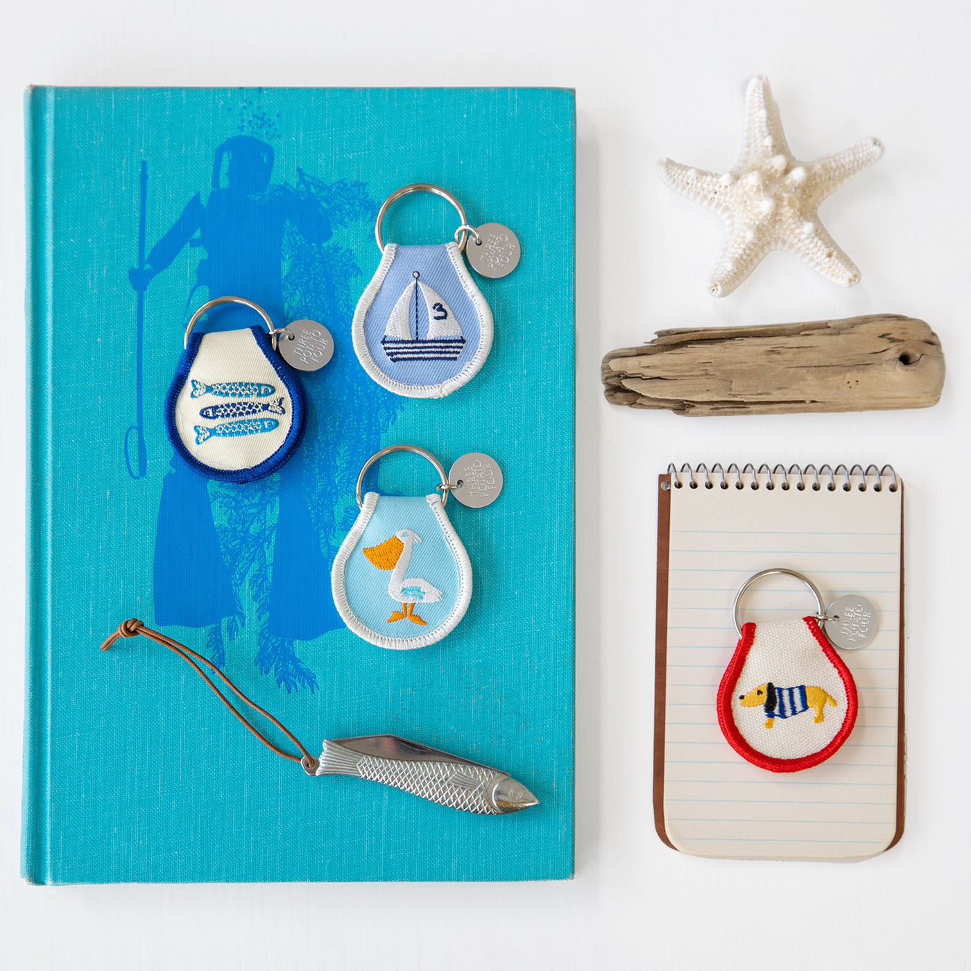 SHAKA RIVER ABOVE TEE 、KEYCHAIN Opposition - Surfboard Keychain | SHAKA TRIBE